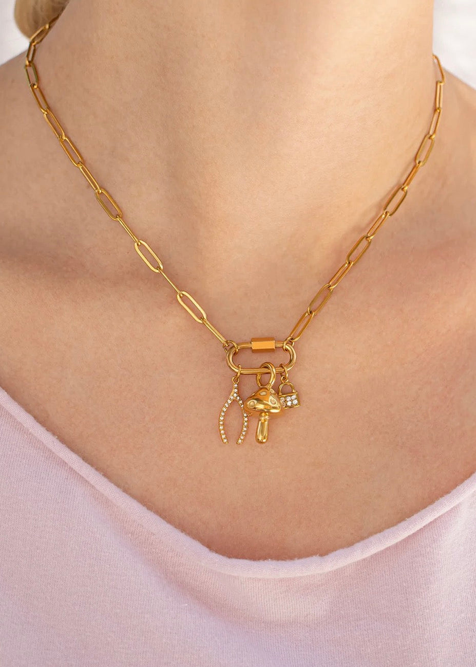 Gold lobster clasp and extender chain close-up